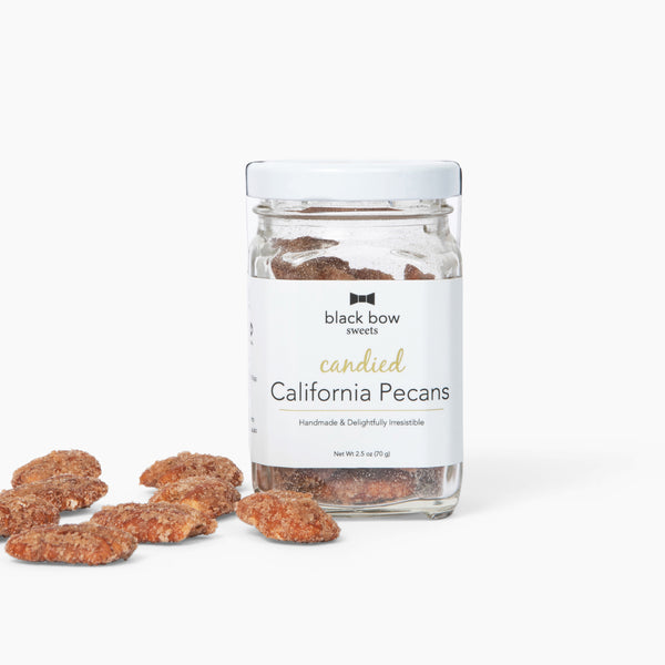 A jar of Black Bow Sweets candied California cinnamon and sugar coated pecans.