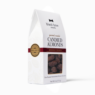 Packaging of black bow sweets candied almonds brownie crunch flavor on a white background