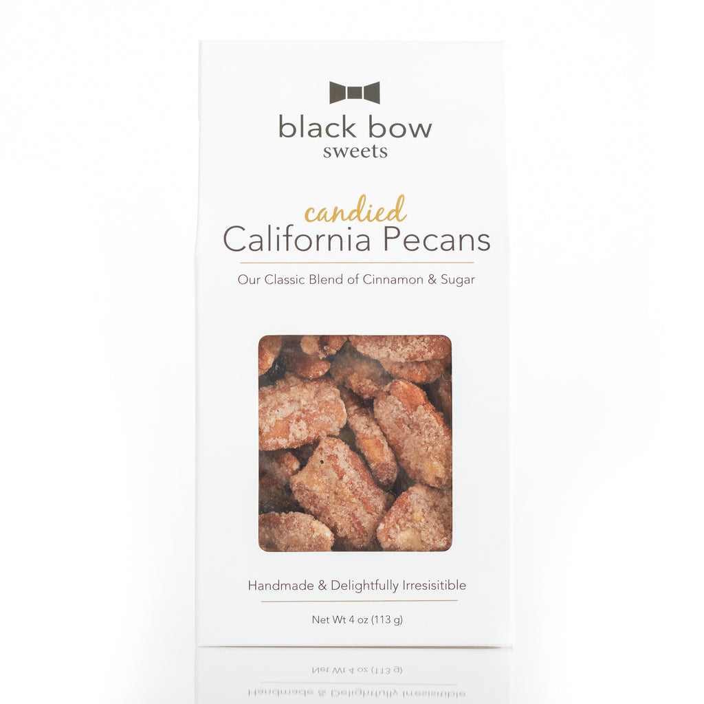 A box of Black Bow Sweets candied California pecans
