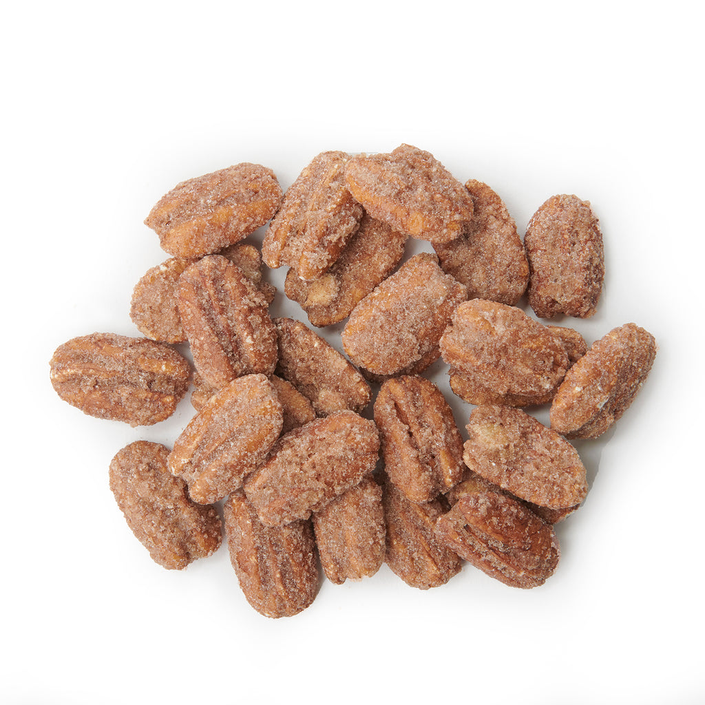 A small pile of Black Bow Sweets candied California cinnamon and sugar coated pecans.