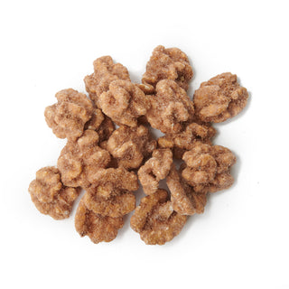 A small pile of Black Bow Sweets candied California cinnamon and sugar coated walnuts.