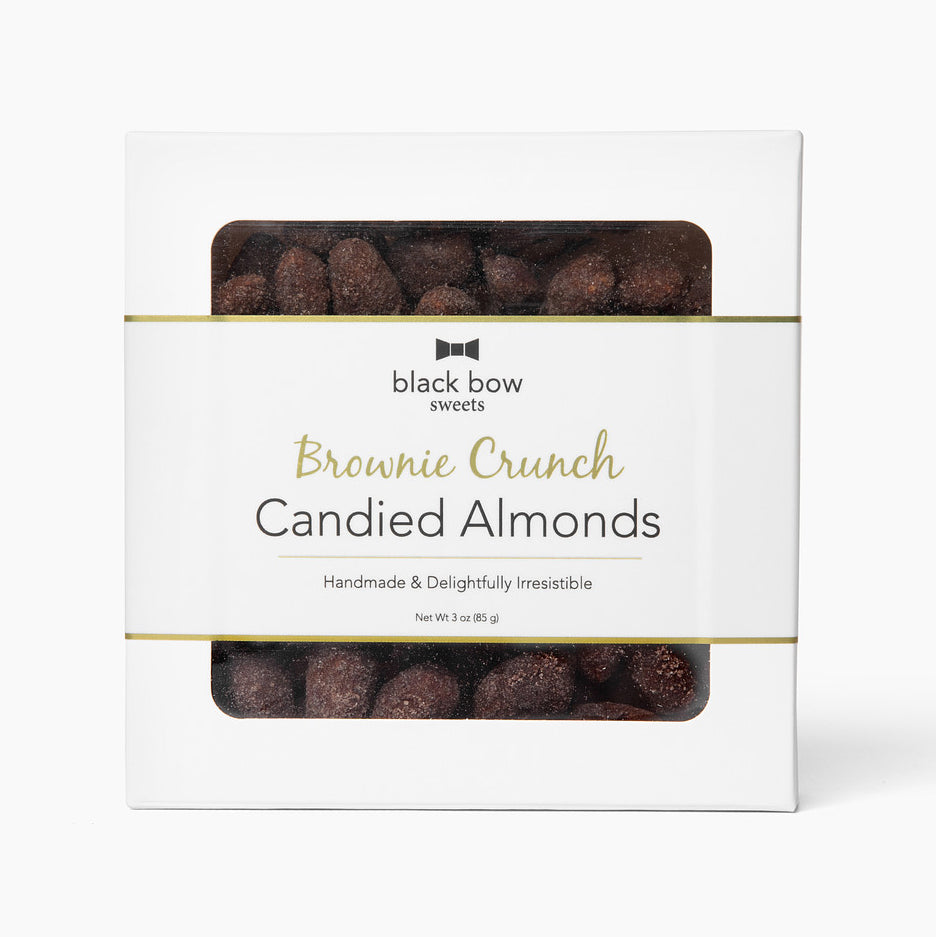 Square box of Black Bow Sweets brownie crunch candied almonds with gold foil border label.