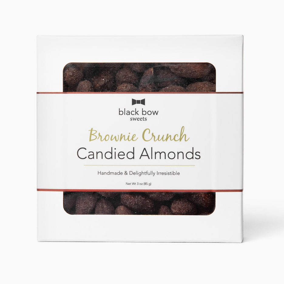 Square box of Black Bow Sweets brownie crunch candied almonds with red foil border label.