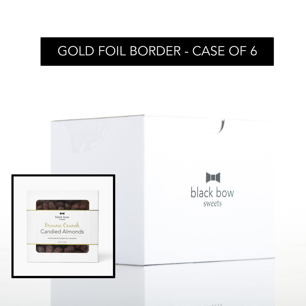 Case of 6 square boxes of Black Bow Sweets brownie crunch candied almonds with gold foil border label.